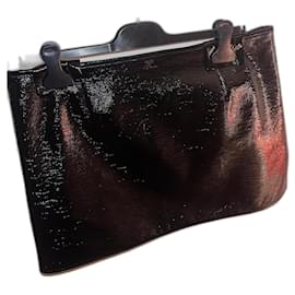 Courreges Minifalda negra de vinilo asimétrica