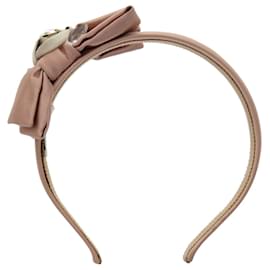 Fascia in satin rosa con gioielli Miu Miu