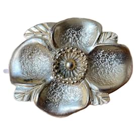 Spilla a forma di fiore dorata Kenzo