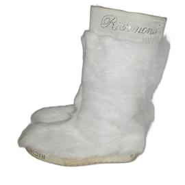 John Richmond flache Stiefel aus weißem Fell