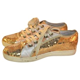 Sneakers Moschino con paillettes oro