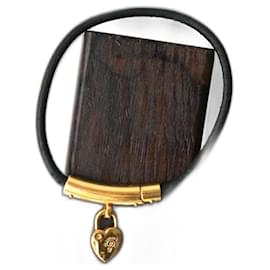 Hermès heart lock charm bracelet in gold-plated metal