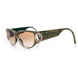 Gafas de sol vintage Christian Dior en verde y dorado.