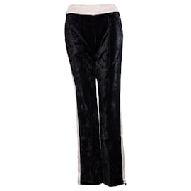 Pantaloni sportivi in velluto Chanel.