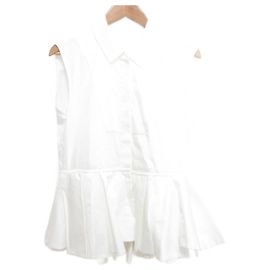 Autre Marque Cygne Peplum ärmelloses Hemd