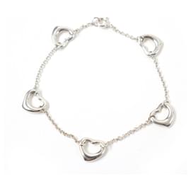 Bracciale charm 5 pezzi Open Heart di Tiffany - Tiffany & Co