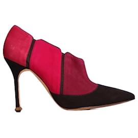 ikonischer Manolo Blahnik aus den 2000er Jahren" oder "Vintage / Pre-Vintage Stück".
