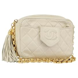 Borsa per fotocamera vintage Chanel con tasca frontale in pelle di agnello trapuntata, piccola