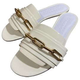 Mules in pelle verniciata Burberry