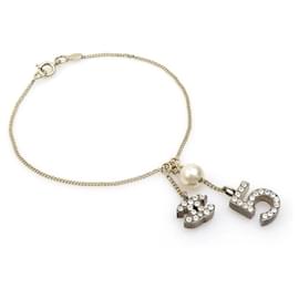 Pulsera de oro Chanel con perlas falsas