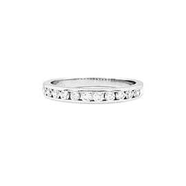 Tiffany & Co. wedding band, "Setting", platinum and diamonds.
