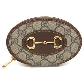 Monedero Gucci GG Supreme Horsebit