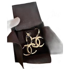 Orecchini Chanel dorati in acciaio