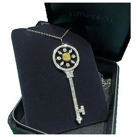 Tiffany & Co Pendente a chiave caleidoscopio in platino, oro giallo 18k, diamante 0,41 ct vvs2
