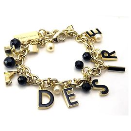 Delizioso bracciale DOLCE & GABBANA acciaio dorato charms "Desire"