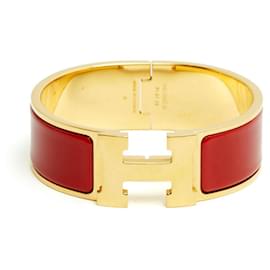 Hermès Golden Red Clic Clac H Bracelet
Golden Metal Red Enamel Bracelet Hermes