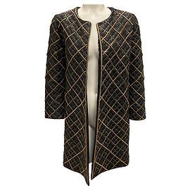 Cappotto in pelle nero / oro decorato con catene Oscar de la Renta