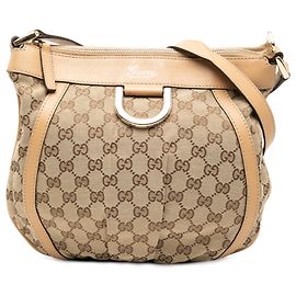 Borsa a tracolla Gucci in tela GG marrone Abbey D Ring