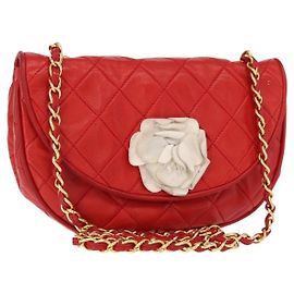 Clutch Rotonda Camelia in Satin e Pelle di Chanel