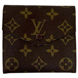 Cartera vintage Louis Vuitton marrón con tres pliegues