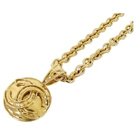 Collana Chanel color oro con pendente