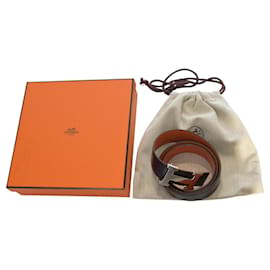 Cinturón Reversible Hermès H de 32 mm en Cuero Togo Negro y Naranja con Hebilla de Plata Talla 80
