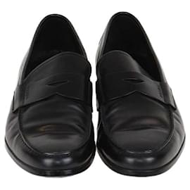 Mocassins en cuir verni noir Prada