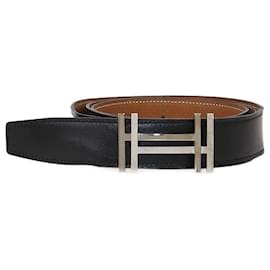 Cinturón reversible de cuero Box negro/dorado y cuero Togo con hebilla H Au Carre de Hermès