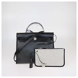Borsa Herbag Zip 31 in tela rivestita nera e pelle di Hermès