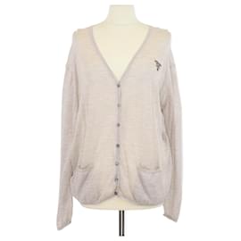 Cardigan in misto lana e seta beige di Prada con logo ricamato a coste