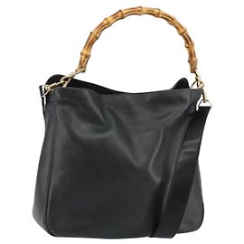 Bolsa de mão em couro Gucci Bamboo preta e dourada 001 1998 1638 Auth 142437