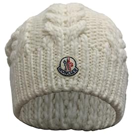 Berretto Moncler con pompon in lana bianca