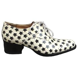 Derbies Free Lance in pelle verniciata bianca