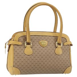 Gucci Borsa a mano Micro GG Supreme in PVC beige e oro 000 106 1325 Auth 157759