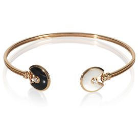 Bracciale Amulette de Cartier in oro rosa, madreperla e onice