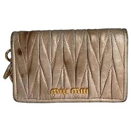 Tarjetero de cuero Metallasse Miu Miu vintage beige