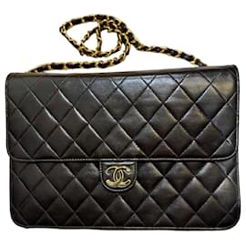 Borsa Chanel Timeless Classique 25 in pelle di agnello nera