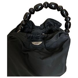 Borsa a mano Christian Dior in nylon nero con manici in pietra