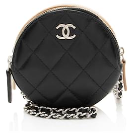 Clutch rotonda a triplo zip in pelle di agnello Chanel con catena