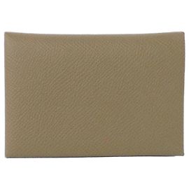 Monedero Calvi Duo de Hermès en gris Etoupe