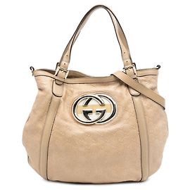 Bolsa Guccissima Web Britt bege de tamanho Medium da Gucci