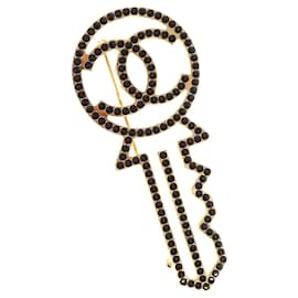 Spilla CHANEL metallo dorato CC Auth 159267V - Chanel