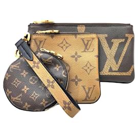 LOUIS VUITTON Pochette Trio Monogramma Gigante Inverso - Louis Vuitton