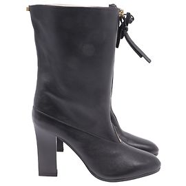 Botas de media caña con cremallera frontal Jett de Stuart Weitzman en cuero negro