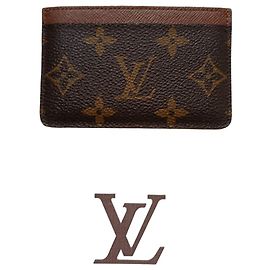 Louis Vuitton Porte Carte is a brown
