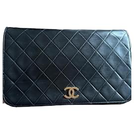 Borsa Chanel Single Flap nera in pelle d'agnello e pelliccia