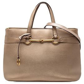 Borsa in pelle dorata Gucci Bright Bit