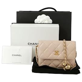 Chanel Borsa a spalla e crossbody mini palla dorata in vita