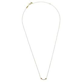 Colgante Tiffany & Co. T Smile en oro amarillo de 18K con diamantes