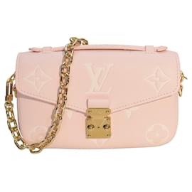 Borsa in pelle rosa poudré Monogram Empreinte Giant Pochette Métis di Louis Vuitton